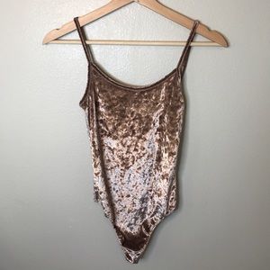 Pink velvet bodysuit from Brandy Melville